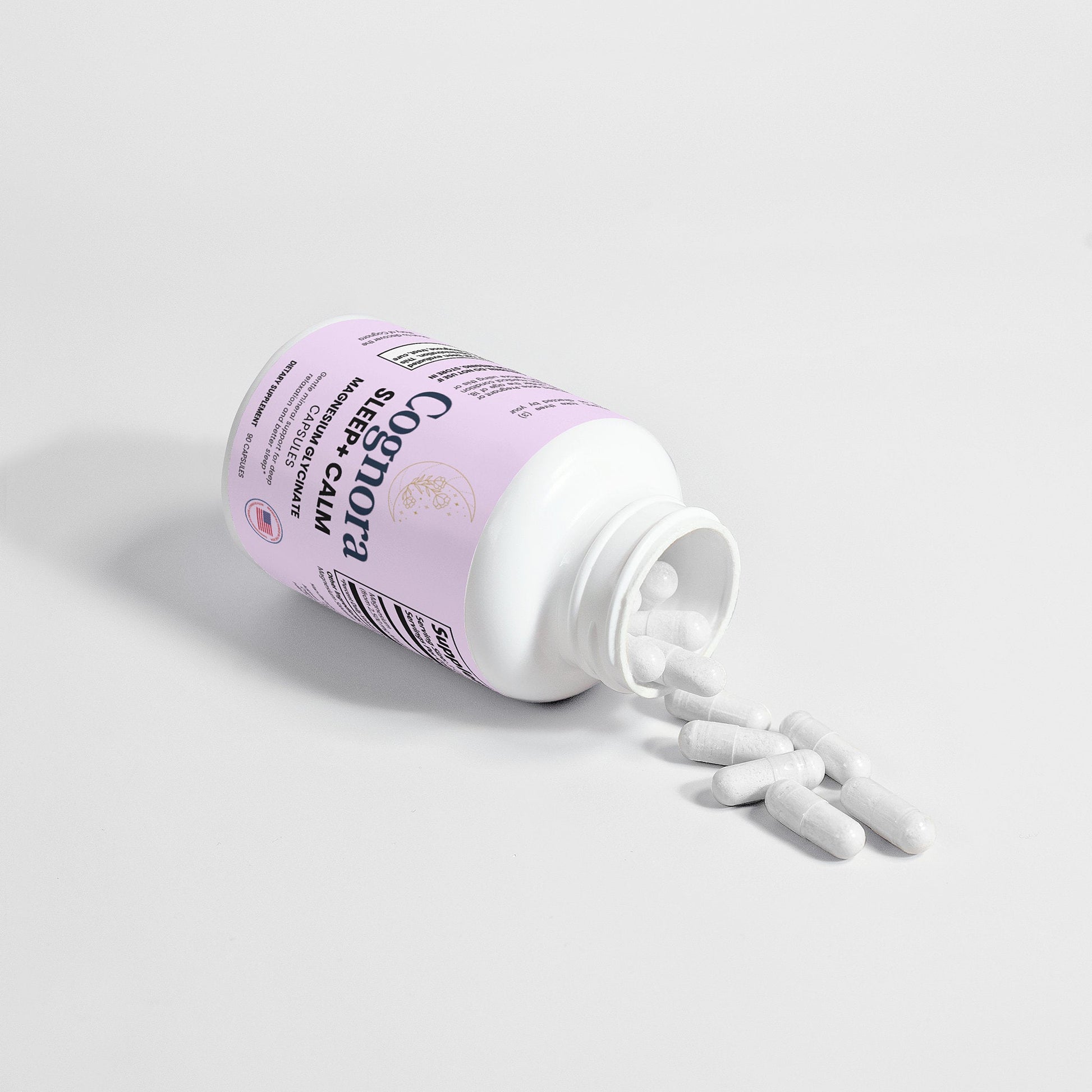Purple bottle of Coq10 cream with white applicator on a light gray background